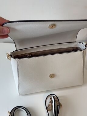Michael Kor’s White Crossbody Bag with Gold Hardware